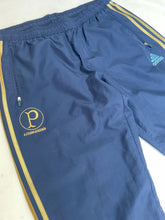 Vintage Adidas Men's Large Navy Blue Track Pants with Gold Stripes